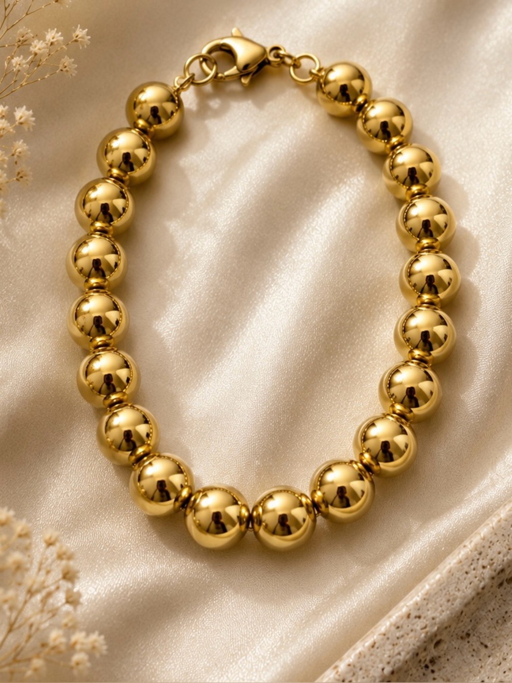 Complimentary Bundle Accent
Piece FREE w 2+ Items. Lauren Gold Ball Bracelet